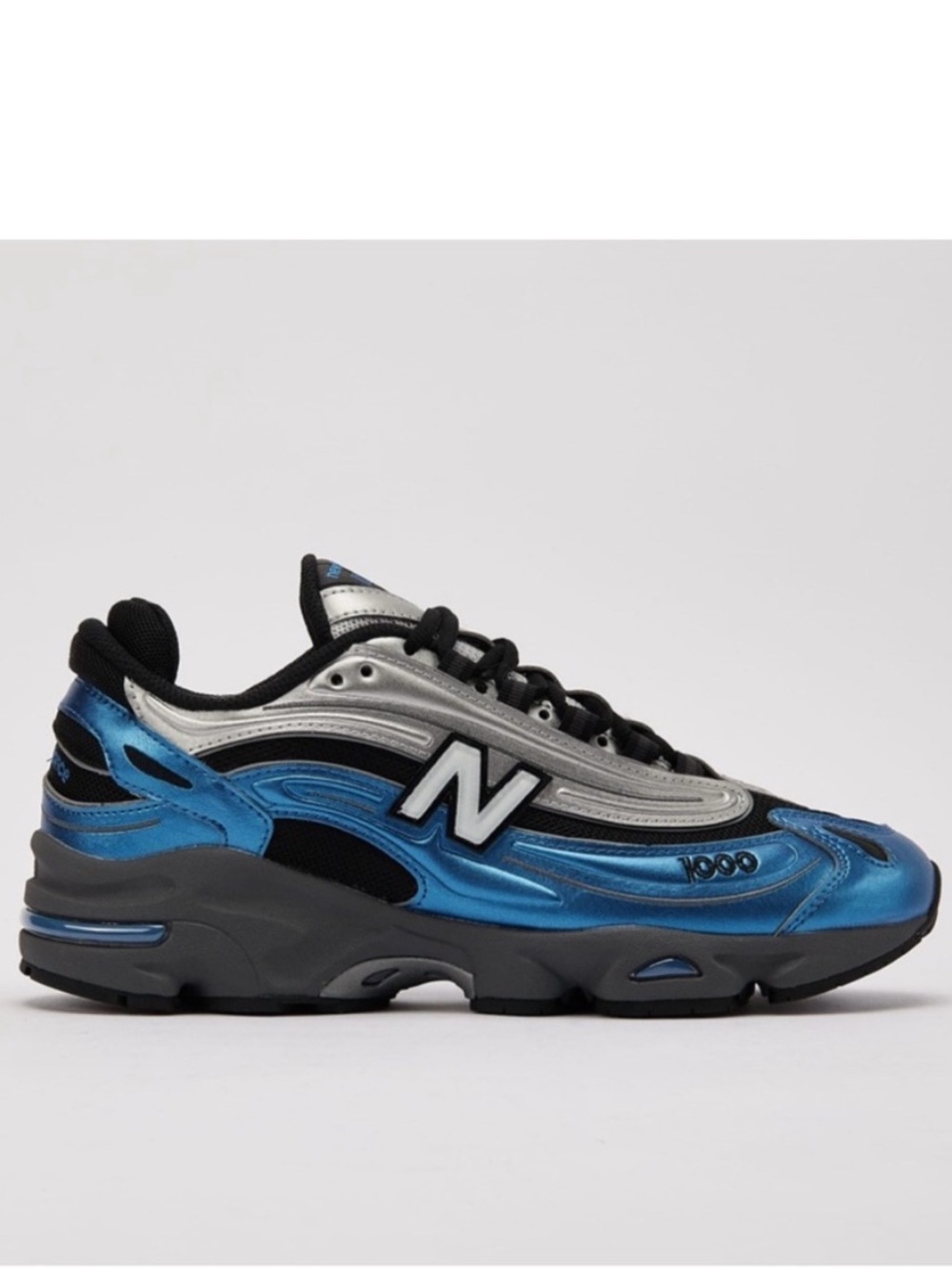 New Balance 1000 NB
Metallic Blue Casual Lifestyle Sneakers M1000ENV-D 8M;
9.5W